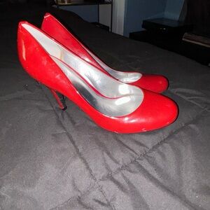 Red patent stilletos